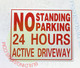 NO STANDING NO PARKING 24 HOURS ACTIVE DRIVEWAY