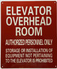 ELEVATOR MOTOR ROOM LOCATED ON THE ROOF SIGN