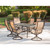 Hanover Manor 7-Piece Outdoor Dining Set with Six Swivel Rockers and a Large Cast-top Dining Table