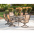 Hanover Manor 7-Piece Outdoor Dining Set with Six Swivel Rockers and a Large Cast-top Dining Table