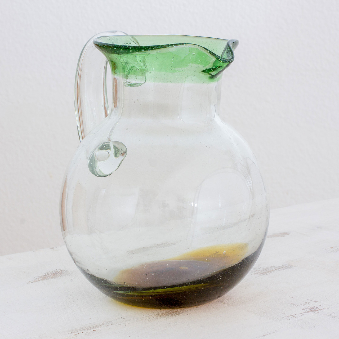 Handblown small glass pitcher