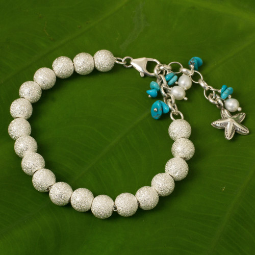 Artisan Crafted Silver Bracelet with Starfish Charm 'Sparkling Waves'