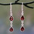 Polished Silver Dangle Earrings with Pear Shaped Garnets 'Mystical Femme'
