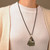 Fish-Themed Brass and Melchior Pendant Necklace with Onyx 'Fish Life'