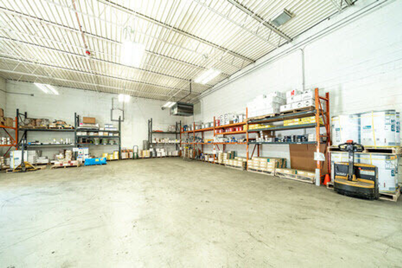 Shelves full of supplies inside a warehouse