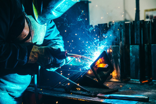 man welding