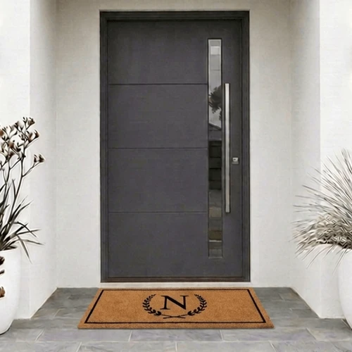 Large Initial door mat at grey front door with N initial 120cm wide