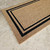 Close Up Image of the black border coir door mat