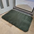 Olive Green door mat at white door