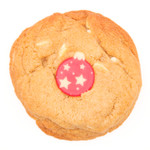 white chocolate cookie with red christmas bauble decoration