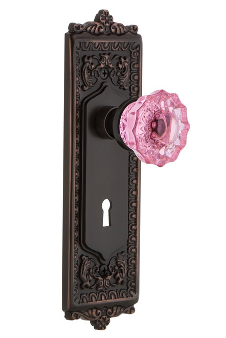 Nostalgic Warehouse - Egg & Dart Plate with Keyhole Passage Crystal Pink Glass Door Knob in Timeless Bronze - EADCRP - 721547 - 2 3/4" Backset