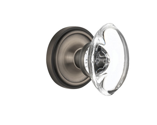 Nostalgic Warehouse - Classic Rosette Passage Oval Clear Crystal Glass Door Knob in Antique Pewter - CLAOCC - 708439 - 2 3/4" Backset