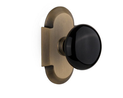 Nostalgic Warehouse - Cottage Plate Passage Black Porcelain Door Knob in Antique Brass - COTBLK - 708501 - 2 3/4" Backset