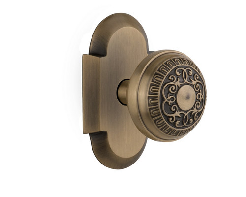 Nostalgic Warehouse - Cottage Plate Passage Egg & Dart Door Knob in Antique Brass - COTEAD - 708541 - 2 3/4" Backset