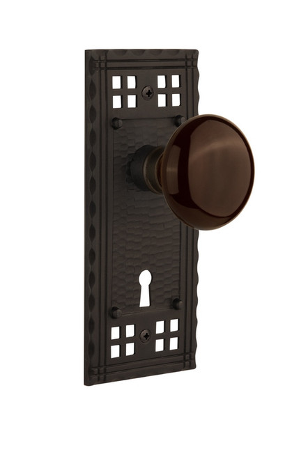 Nostalgic Warehouse - Craftsman Plate with Keyhole Privacy Brown Porcelain Door Knob in Oil-Rubbed Bronze - CRABRN - 717982 - 2 3/4" Backset