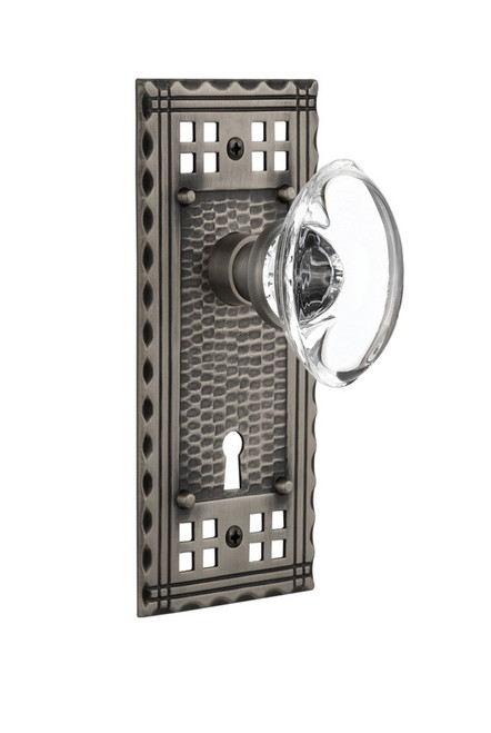 Nostalgic Warehouse - Craftsman Plate with Keyhole Passage Oval Clear Crystal Glass Door Knob in Antique Pewter - CRAOCC - 710148 - 2 3/4" Backset