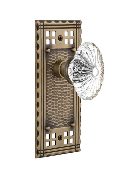 Nostalgic Warehouse - Craftsman Plate Privacy Oval Fluted Crystal Glass Door Knob in Antique Brass - CRAOFC - 714764 - 2 3/4" Backset