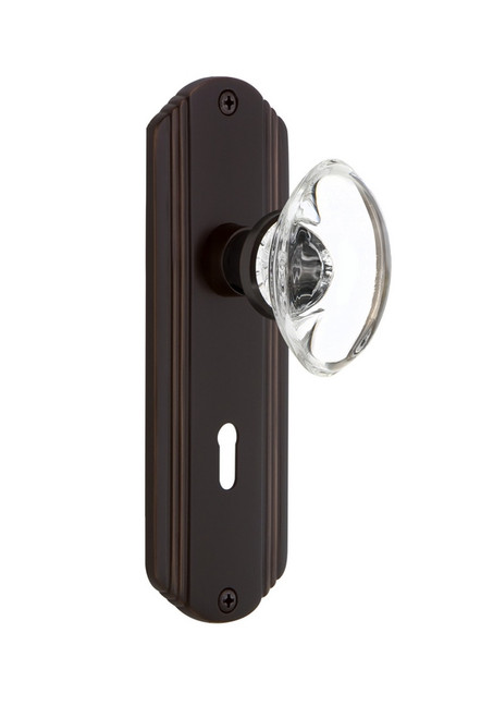 Nostalgic Warehouse - Deco Plate with Keyhole Passage Oval Clear Crystal Glass Door Knob in Timeless Bronze - DECOCC - 700396 - 2 3/8" Backset