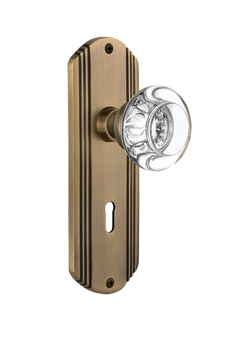 Nostalgic Warehouse - Deco Plate with Keyhole Passage Round Clear Crystal Glass Door Knob in Antique Brass - DECRCC - 705878 - 2 3/8" Backset
