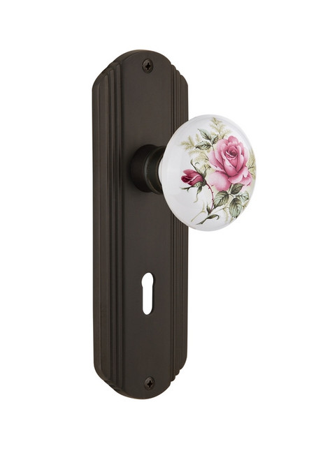 Nostalgic Warehouse - Deco Plate with Keyhole Passage White Rose Porcelain Door Knob in Oil-Rubbed Bronze - DECROS - 705845 - 2 3/8" Backset