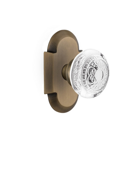 Nostalgic Warehouse - Cottage Plate Passage Crystal Egg & Dart Knob in Antique Brass - COTCED - 750124 - 2 3/8" Backset