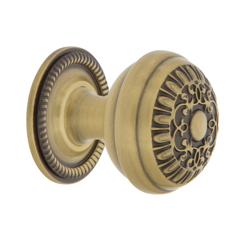 Nostalgic Warehouse - Egg And Dart Brass 1 3/8" Cabinet Knob with Rope Rose in Antique Brass - CKB-EADROP - 769490