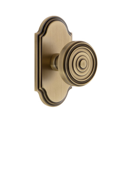 Grandeur Hardware - Arc Plate Dummy with Soleil Knob in Vintage Brass - ARCSOL - 811425