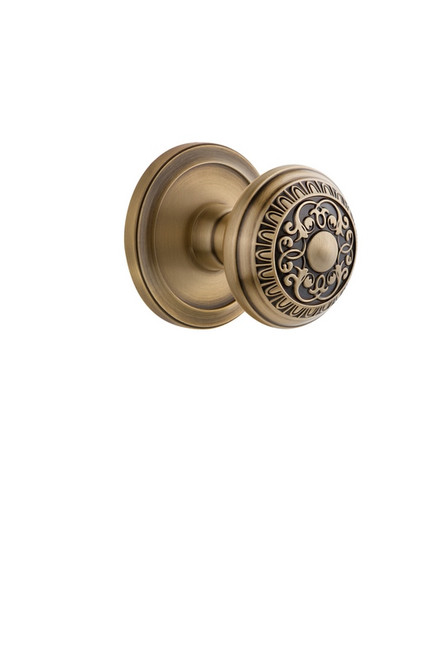 Grandeur Hardware - Circulaire Rosette Double Dummy with Windsor Knob in Vintage Brass - CIRWIN - 810564