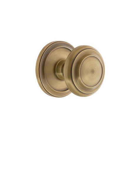 Grandeur Hardware - Circulaire Rosette Passage with Circulaire Knob in Vintage Brass - CIRCIR - 809863