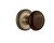 Nostalgic Warehouse - Classic Rosette Privacy Brown Porcelain Door Knob in Antique Brass - CLABRN - 710728 - 2 3/8" Backset