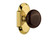 Nostalgic Warehouse - Cottage Plate Passage Brown Porcelain Door Knob in Polished Brass - COTBRN - 708512 - 2 3/4" Backset