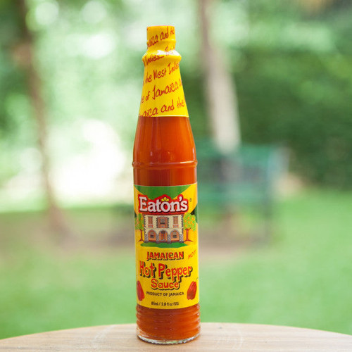 If you like hot sauce, Eaton’s Jamaican Hot Pepper Sauce is the perfect accessory for your table. Sprinkle on any meal or use in cooking to add heat to meat dishes, sauces, gravies, dips.