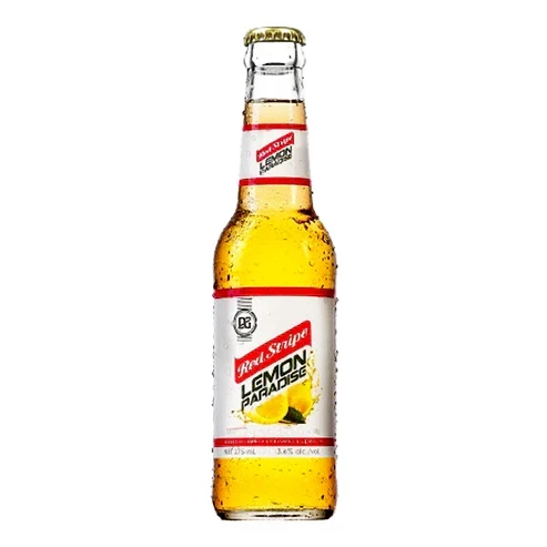 Experience a refreshing twist on a classic Caribbean staple. Red Stripe Lemon Paradise is a revolutionary, naturally flavoured full-strength lager that seamlessly blends Jamaica’s famous beer with the crisp, sweet taste of real lemon extract. Light, smooth, and delightfully sweet, it offers a refreshing citrus finish that serves as an instant summer-style escape in every bottle