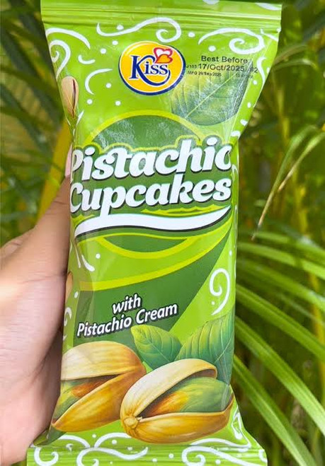 Treat yourself to the delicious taste of Kiss Pistachio Cupcakes! Soft, moist, and bursting with rich pistachio flavor, these delightful cupcakes are topped with a
