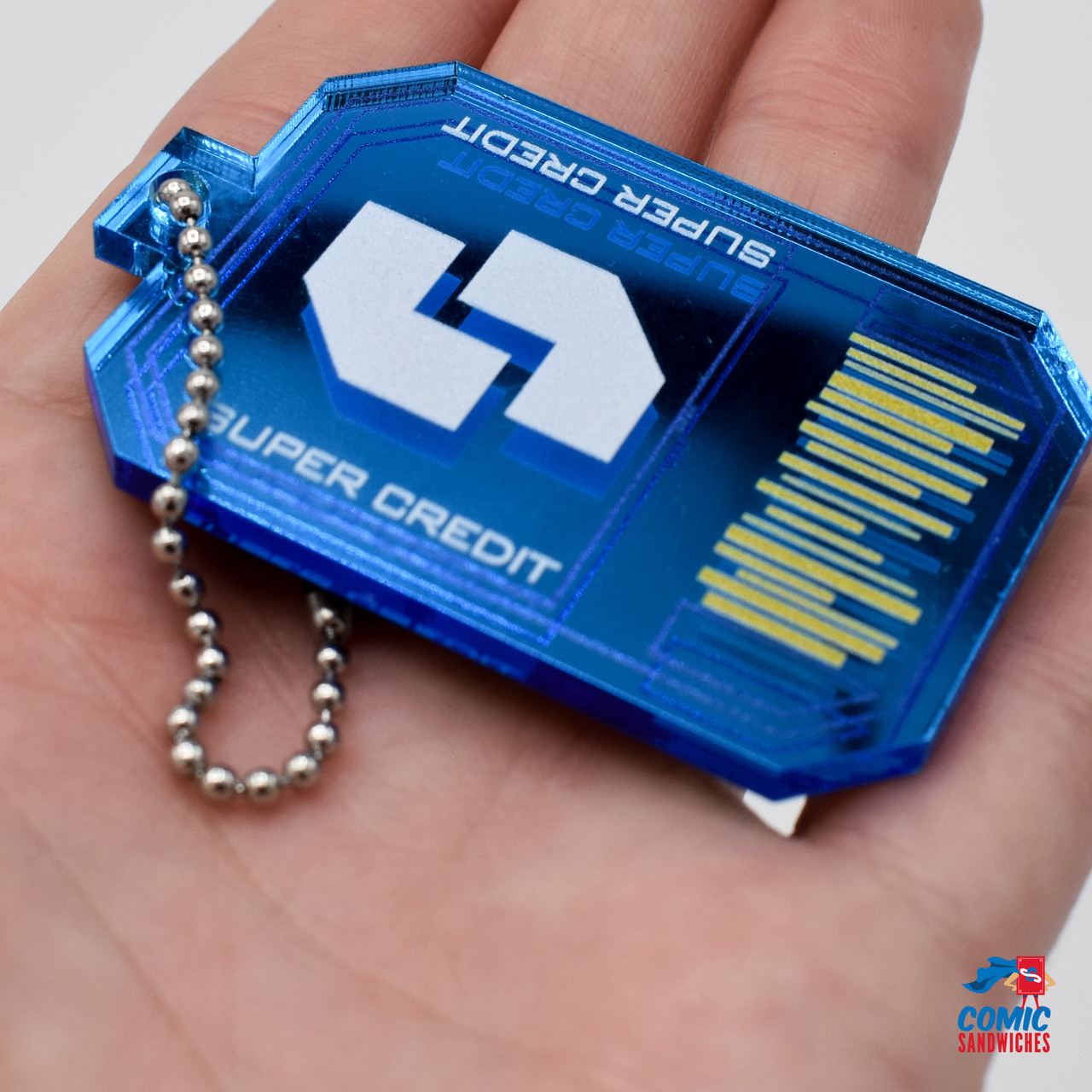 アクセサリー kaiDIVE Helldivers 2 Super Credit Keychain - For Democracy Enthusiasts!