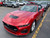 Red convertible Mustang with Jflaps splash guards full view