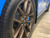 Grabber blue Mustang with Jflaps stone guards behind front and rear