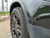 2020-2026 Land Rover Defender with front 1FastGuard stone guards. Close up.
