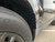 2020-2026 Land Rover Defender with front 1FastGuard mud flaps inside view.