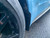 Example of Front view 2026 Porsche Panamera 4 with 1FastGuard stone guards with MiniFlap on front inside view