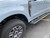 Ford Super Duty with wide 1FastGuard stone guard on front. inside view