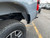Ford Super Duty with wide 1FastGuard stone guard on rear. inside view
