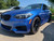 2020 BMW M240i with low mount front 1FastGuard mudlfaps