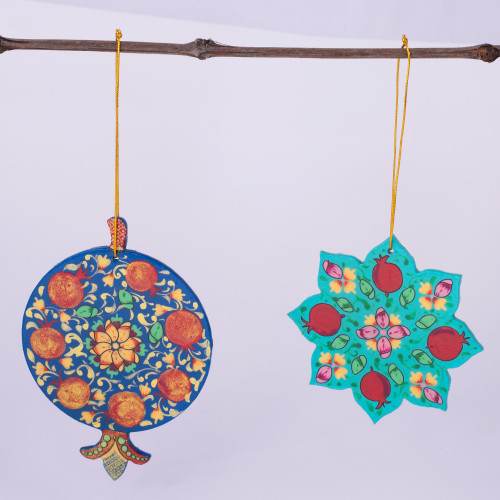 Pair of Lacquered Wood Star and Pomegranate Ornaments 'Star and Pomegranate'