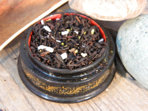 <p>A deliciously creamy coconut tea to help you drift away to tropical shores.  China black tea blended with natural coconut flavour and little pieces of  flaked coconut.</p>




<p>Drink when: You find sand in your sandals.</p>




<p>Your item will be packed in new recycled tin tie bags suitable for packaging coffee and leaf tea. Our block bottom tin tie bags are poly-lined and food grade safe.</p>