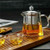 <p><strong>Description</strong><br />




 <br />




If you enjoy tea, this exquisitely made teapot will be your ideal choice. Suitable for a single cup.  The stainless steel infuser insert has a fine mesh for your loose leaf  tea and is easily cleaned. The teapot is made of clear glass which allows you to  observe the change of color and monitor the brewing process. Suitable for all tea types.<br />




 <br />




 <strong>Features</strong><br />




 <br />




- Color: Transparent<br />




- Material: Stainless steel and Boriscillate glass.<br />




- Size: 7.2 x 7.2 x 11 cm.<br />




- Made in square shape, unique and timeless.<br />




- Infuser design, easy to remove old tea leaves and clean.<br />




- Clear glass teapot, good to moniot the brewing process.<br />




</p>




<p>Package includes</p>




<p>1 x 350ml glass teapot</p>