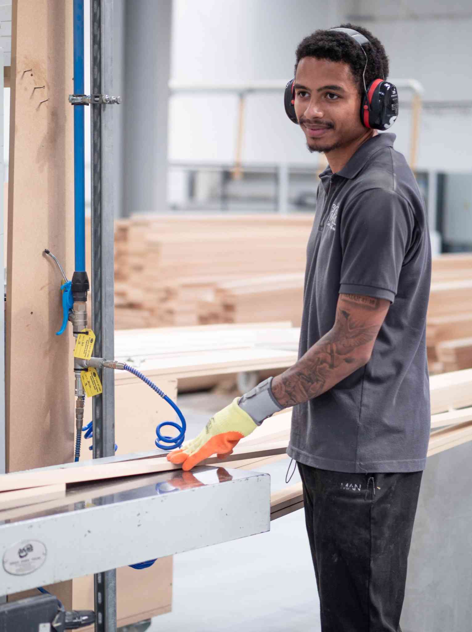 MDF boards being fed through moulder machine