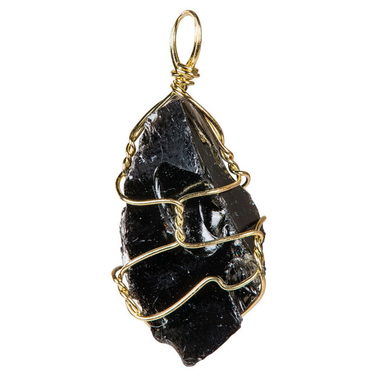 image of a gold tone wire wrapped rough black obsidian pendant  on a white background