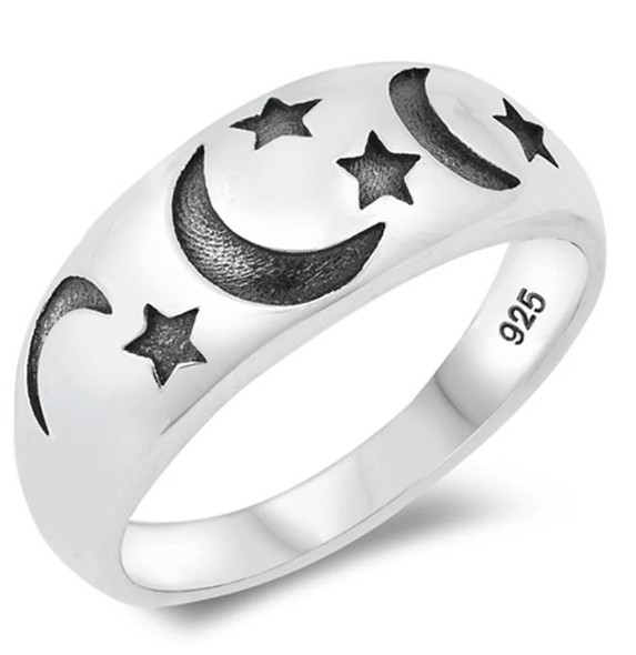 sterling silver thick band ring with black oxidized cresent moon and stars