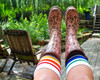 Unisex pride socks worn with confidence by queer individuals and allies